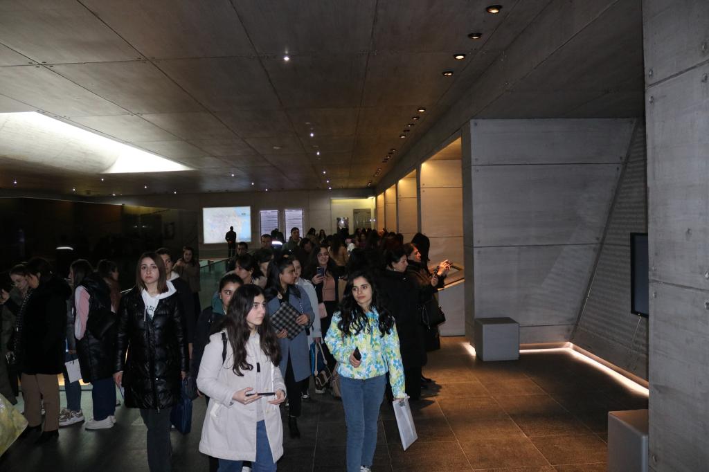 Mass flow continues to the Genocide Memorial Complex.