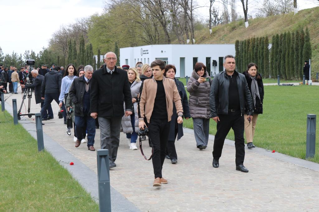 Mass flow continues to the Genocide Memorial Complex.