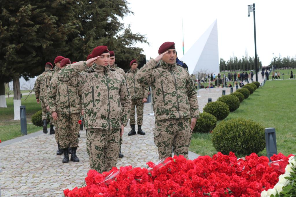 Mass flow continues to the Genocide Memorial Complex.