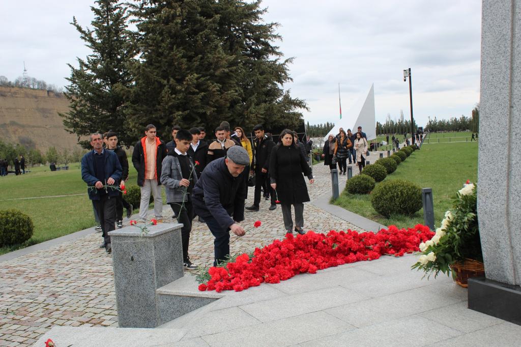 Mass flow continues to the Genocide Memorial Complex.