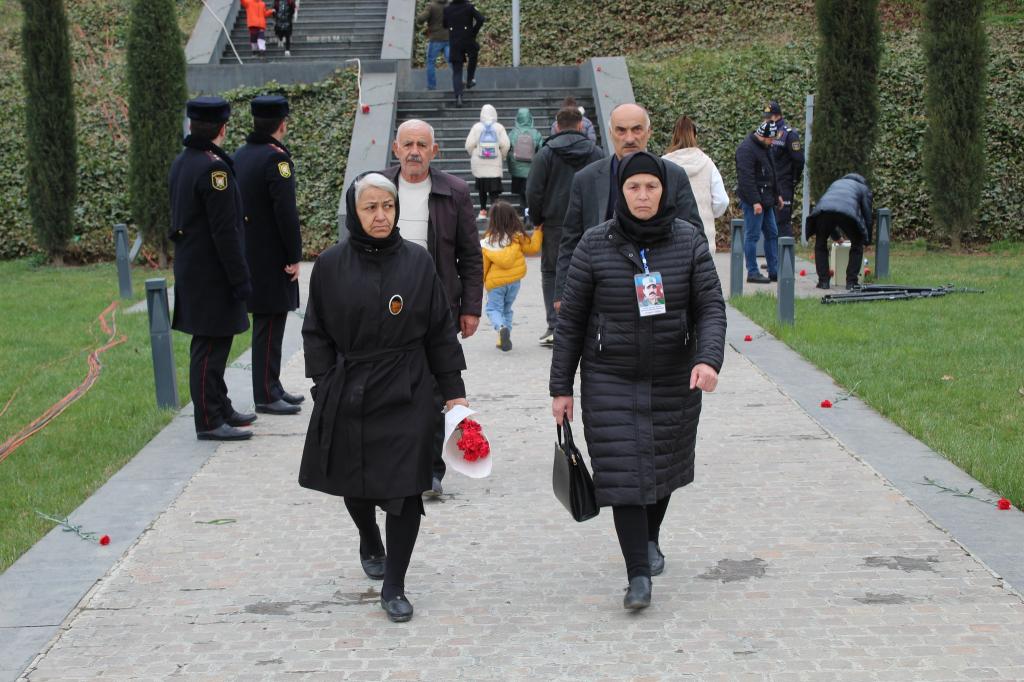 Mass flow continues to the Genocide Memorial Complex.