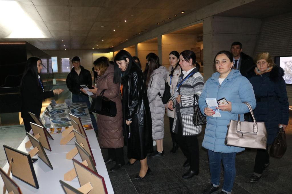 Mass flow continues to the Genocide Memorial Complex.