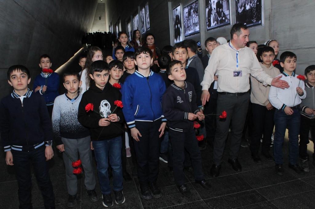 In observance of the Day of the Genocide of Azerbaijanis on March 31st, a significant influx of visitors persists at the "Genocide Memorial Complex" in Guba. Among the visitors, military personnel, teachers, and students from general education institutions comprise the majority.